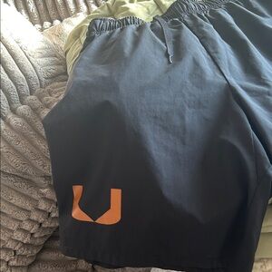 Nike Men's Black Athletic Shorts with Orange Accent